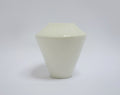 Geometric ceramic vase on a white background