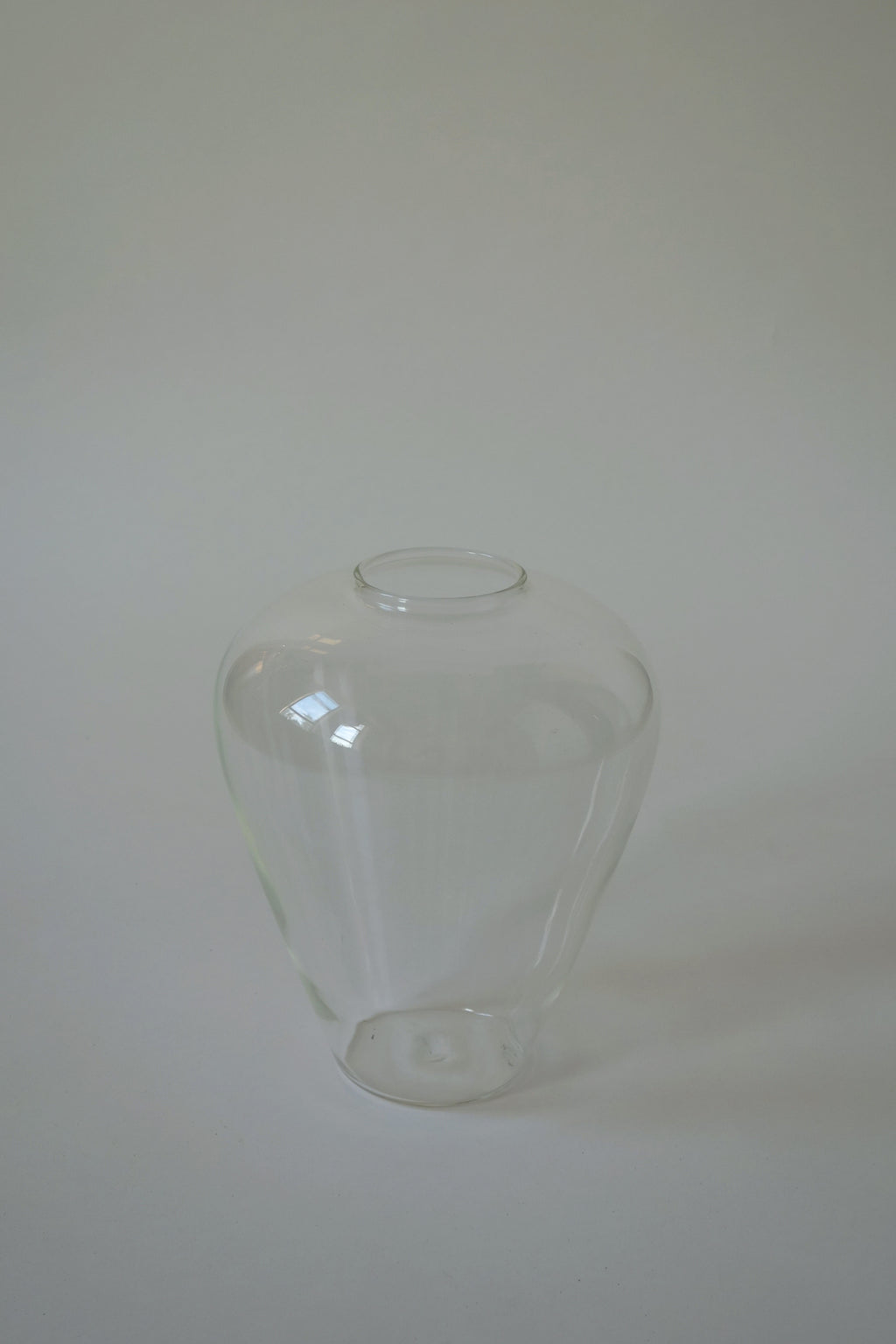 Clear glass vase on a white background